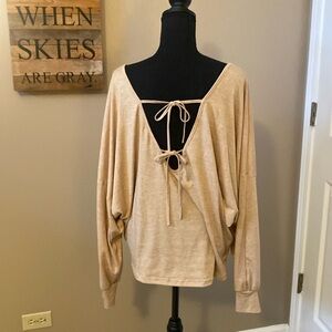 Beige v-neck top with fun detailed ties in back and dolman sleeves, Sz L